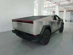 Silver Tesla Cyber Off-Road Pickup Truck with All Steel Body and 180 Km/h Max