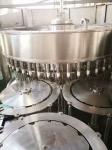 PLC 5000BPH Rotary Bottle Filling Machine SUS304 Touch Screen