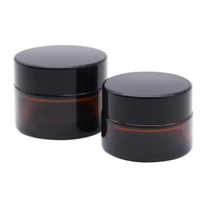 China 5g 20g 4oz 8oz Cosmetic Glass Jars Black Cap Amber Apothecary Jars on sale