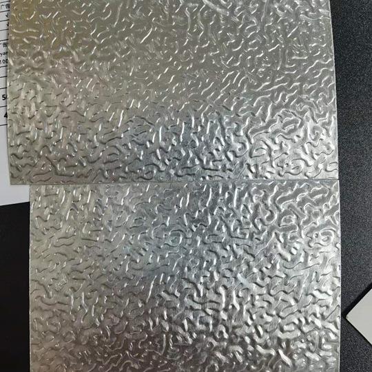 Alloy3105 H26 Temper Grade 26 Gauge Thick White Color Stucco Embossed Aluminum