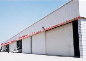 China Manual Folded Push Pull Overhead Industrial Garage Doors Track And Hardware Of Aircraft Hanger wholesale