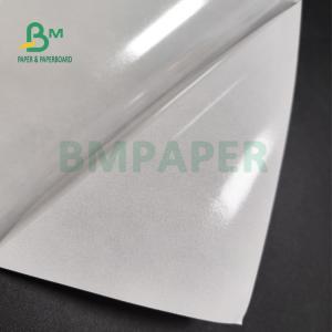 China Glossy White Adhesive Sticker Paper 75gsm 80gsm For Supermarket One Side Cast Coating wholesale