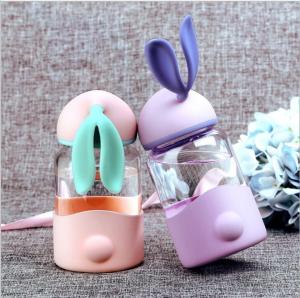 China 340ml Kids Rabbit Shaped Gift Unbreakable Glass Water Bottle With Silicone Sleeve wholesale