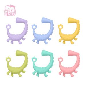 China Bpa Free Funny Dinosaur Chew Silicone Baby Teether For Toddler wholesale