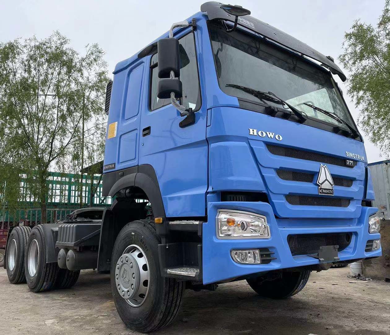Automatic Transmission Tipper used HOWO 371hp tractor Your Best Bet for Transportation constructing a building