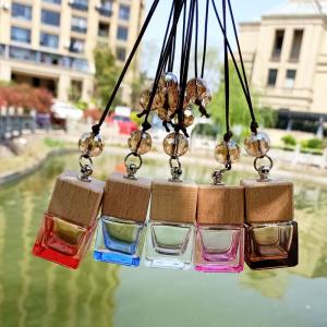 China Diffuser Crystal Glass Bottles Colorful Green Pink Yellow With Wood Cap wholesale
