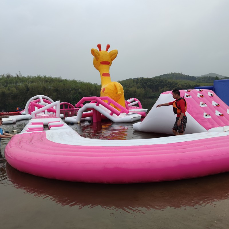 Modular Inflatable Water Park with Custom Floating Obstacle Course Slides Climbing Elements And Connected Play Platforms for Lake Resort Beach And