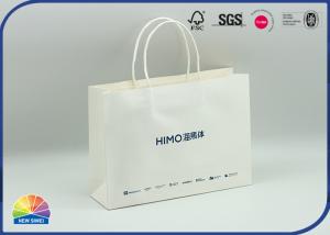China Custom Printing Logo White Paper Shopping Bag Stand Up Kraft Bag on sale