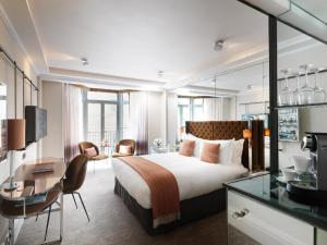 China Negeri Kedah hotel furniture supplier made Guestroom bedroom sets by Fabric bed and Stainless steel with wood desk table wholesale