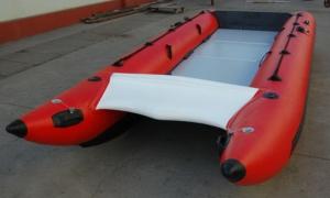 China Red Hand Crafted High Speed Inflatable Boats Racing Catamaran Boat With 450cm Length wholesale