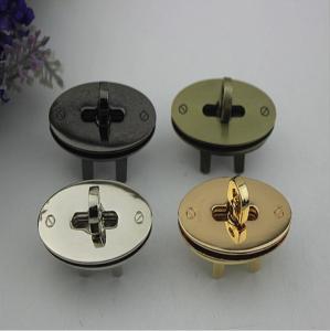 China Fashion new style oval shape zinc alloy gunmetal color bag turn locks wholesale