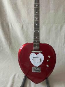 China Custom Heart Shaped Electric Guitar in Black Short Scale Mahogany Body Humbucker Pickups Professional Guitar wholesale