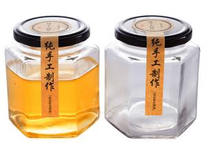 China Clear Hexagon Honey Jars Hexagon Glass Jar With Black Lids 100ml 180ml wholesale