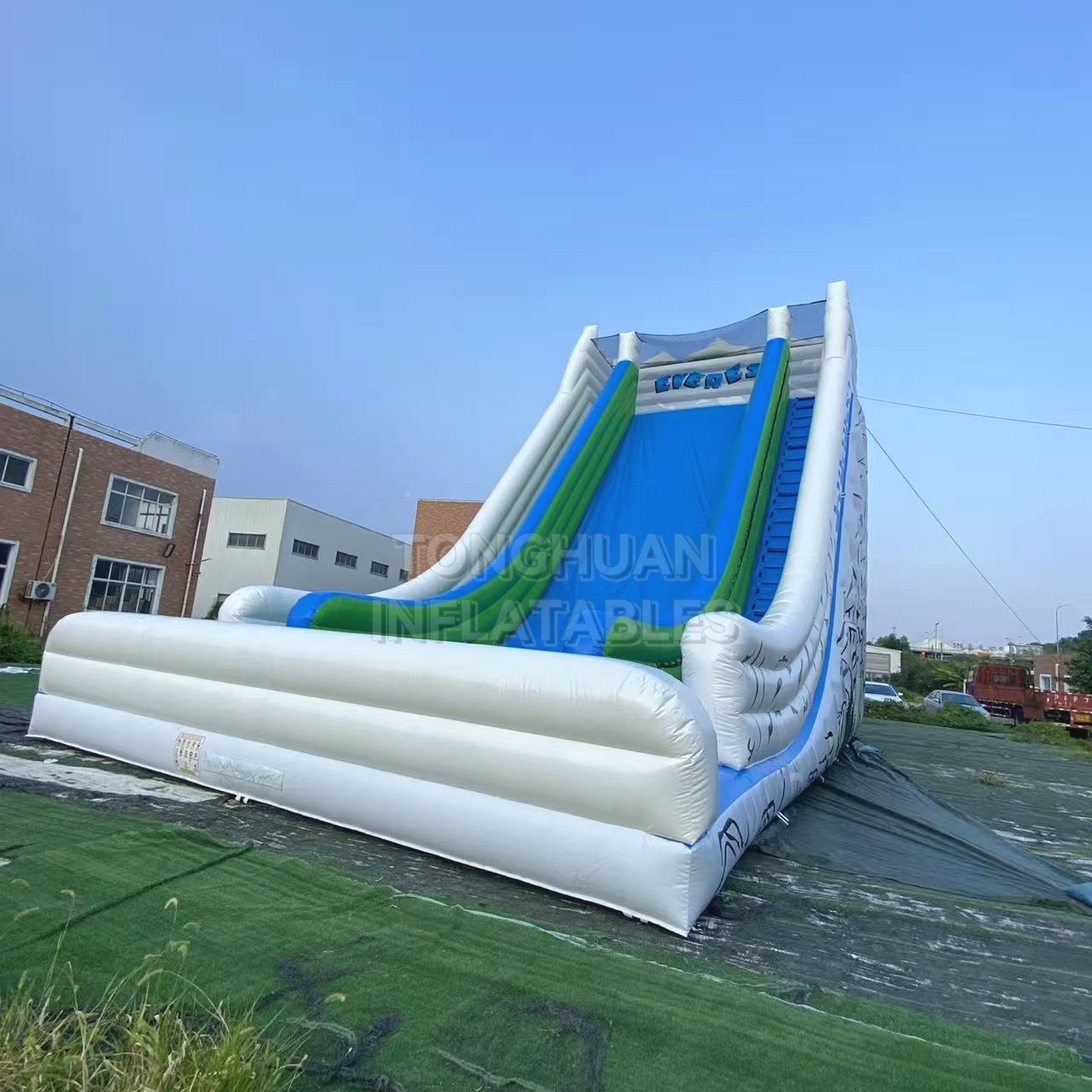 Commercial Giant Everest Theme Inflatable Slide with Extended Landing Area Climbing Ladder and Safety Net for Parks Events and Rental Business