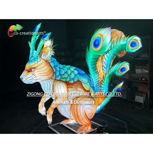 Giant Illuminated Squirrel Sculpture Lantern With Dazzling Peacock Feather Tail