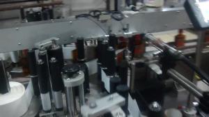China Shrink Wrap Bottle Sticker Labelling Machine 220 Volt 2000*700*1400mm Size wholesale