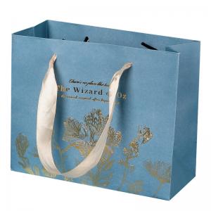 China Shopping Cardboard Clothing Packaging Kraft Paper Bags With Ribbon Handle on sale
